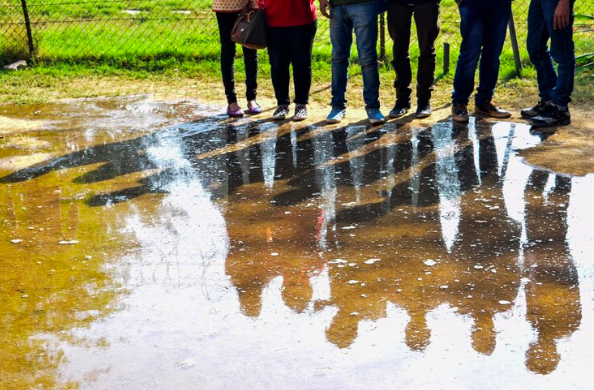 https://www.freepik.com/premium-photo/low-section-people-standing-by-puddle_99767363.htm#fromView=search&page=2&position=14&uuid=02804daf-ea06-4451-8d18-8392e60f2f25